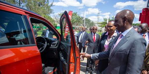 President William Ruto inspecting a locally assembled car on June 7, 2023.