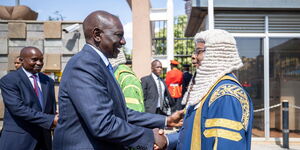 President William Ruto (left) shaking hands with Senate Speaker 