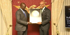President William Ruto (left) receiving the American Academy of Achievement Award at Washington DC on December 18, 2023.