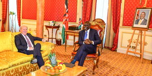 Axel van Trotsenburg (left), the  Senior Managing Director of the World Bank Group alongside President William Ruto during a meeting in Italy on January 29, 2024