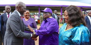 President William Ruto exchanges pleasantries  COTU boss Francis Atwoli  and FKE  Executive Director  Jacqueline Mugo during the Labour Day Celebrations at Uhuru Gardens on May 1, 2023