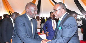 President William Ruto (left) greets Agriculture CS Mithika Linturi in Meru on September 17, 2019.