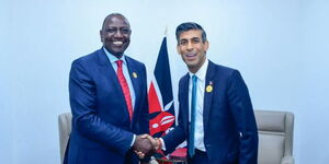 President William Ruto (left) with British PM Rishi Sunak in Dubai on the sidelines of COP28.