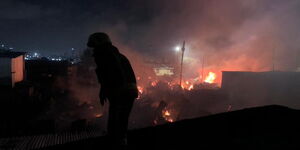 Property burning after a fire broke out in Lang'ata on Saturday night February 11, 2024