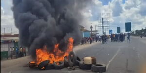 A screengrab of protestors blocking a section of Mombasa Road on May 16, 2023.