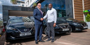 From Left to Right: Mr Russel Storey, General Manager, Radisson Blu, Nairobi Upperhill and Martin Murungi, Managing Director, Humming Bird Transport at the launch of the Electric Vehicles at Radisson Blu Hotel, Nairobi, Upperhill. 
