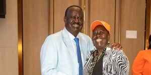 Former Prime Minister Raila Odinga (left) and Kisumu Woman Representative Ruth Odinga pose for a photo.