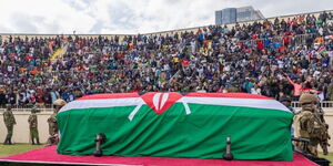 Raila in coffin 