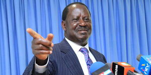 Raila Odinga smiling while delivering a speech