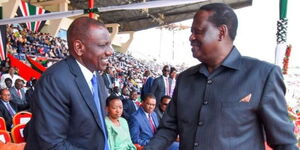 President William Ruto (left) with ODM leader Raila Odinga at Nyayo National Stadium during a past Jamhuri Day celebration. 