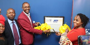 Riara Vice Chancellor Robert Gateru (in maroon blazer) and Data Commissioner Immaculate Kassait (right) opening the Acyberschool Riara University (ARU) Hub.