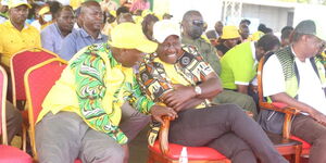 Mathira MP Rigathi Gachagua speaks with Deputy President William Ruto during a rally in Kirinyaga County on Saturday, January 29. 