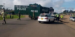 Police Erect a makeshift roadblock along a busy highway