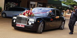 A Rolls Royce vehicle decorated for use at a wedding