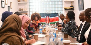 A photo of the Diaspora Affairs Permanent Secretary holding talks with Kenyans in Canada in October 2023