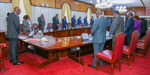 President William Ruto leading his cabinet in prayers before a meeting on May 16, 2023.