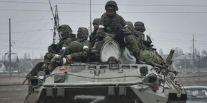 Russia's military pictured advancing towards Ukraine 