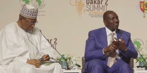 President William Ruto alongside another delegate at the Dakar 2 Summit conference in Senegal on January 25, 2023.