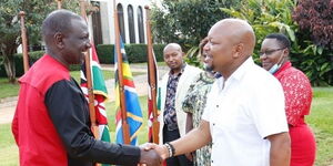Deputy President William Ruto and Raymond Kuria during a meeting at Karen on Tuesday, May 25