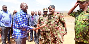 President William Ruto greeting police bosses at a training camp on February 23, 2023.