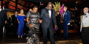 President William Ruto and First Lady Rachel Ruto holding their hands during a State Dinner at the White House on May 24, 2023.