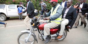 President William Ruto on board a boda boda in 2021