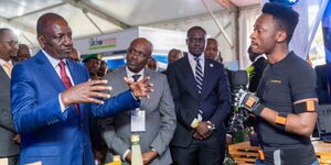 President William Ruto engaging with exhibitors during the launch of the 4th Kenya Innovation Week in Nairobi on Wednesday, November 27, 2024.