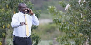 Deputy President William Ruto making a phone call.