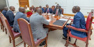 President William Ruto receiving a progress report from South Sudan Chief Mediator Generall Lazarus Sumbeiywo on May 7, 2024. 