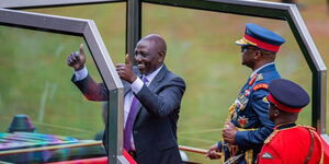President William Ruto and Chief of Defence Forces Francis Ogolla on the ceremonial car on Thursday June 1, 2023