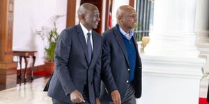 President William Ruto (left) and KANU party Leader Gideon Moi waliking side by side at State House in Nairobi on Thursday, October 9, 2025.