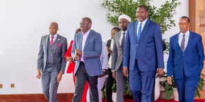 President William Ruto (centre) and Public Service Cabinet Secretary Geoffrey Ruku at State House on July 4, 2025.