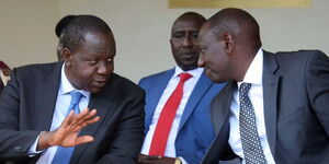 President William Ruto (right) and former Interior Cabinet Secretary Fred Matiang’i (left) at a past event. 