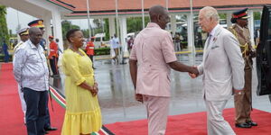 President William Ruto shakes hands with King Charles III on November 3, 2023 in Mombasa, Kenya.