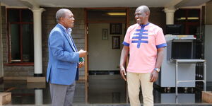 Treasury Cabinet Secretary Njuguna Ndung'u (left) with President William Ruto Karen, Nairobi County on April 22, 2021