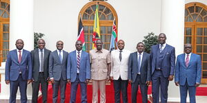 President William Ruto (centre) poses for a photo with five ODM MPs at State House, Nairobi on September 13, 2023. 
