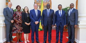 President William Ruto (centre) poses for a photo alongside Tourism CS Alfred Mutua and Canadian High Commissioner Christopher Thornley in January 2023. 