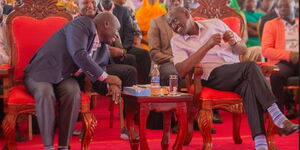 President William Ruto (right) chats with his Deputy Rigathi Gachagua during a Sunday service at Isiolo High School, Isiolo County on May 21, 2023.