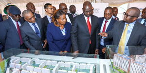 President William Ruto, Housing PS Charles Hinga and Machakos Governor Wavinya Ndeti going through housing plans on April 15, 2023. 