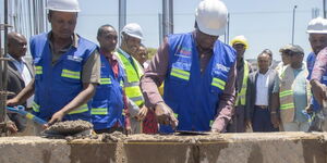 President William Ruto laying a stone of an affordable house in Murang'a on February 14, 2024.