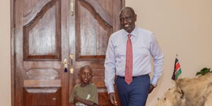 President William Ruto (left) takes Mutinda Mutuku, a Grade One pupil from Kiambani Primary School in Makueni County on a tour of State House on November 28, 2023. 