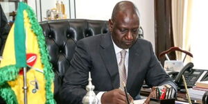 President William signing a bill into law at State House, Nairobi on December 12, 2022.