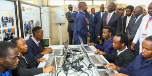 President William Ruto interacting with students of the Technical University of Kenya (TUK) during his visit to the institution on December 8, 2022.