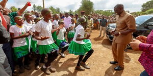 President Ruto with pupils in Meru