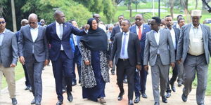 Nairobi County Governor Johnson Sakaja (third left) leads a group of politicians and mayors from Somalia in a walk in Nairobi on May 17, 2023. He is accompanied by Nairobi County Deputy Governor Njoroge Muchiri (in red tie).