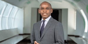 Safaricom Plc CEO Peter Ndegwa posing for a photo
