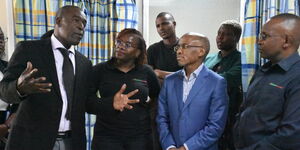 Safaricom CEO, Peter Ndegwa (in blue suit) leading a delegation of Safaricom during a visit to the Kenyatta National Hospital on July 3, 2024.