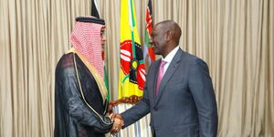 Saudi Arabia Ambassador to Kenya Khalid AL salman shaking hands with President William Ruto at State House on February 21, 2023