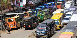 Several buses at a red light in Nairobi Central Business District