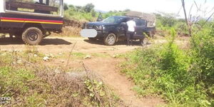 Police cars parked at the scene of a shooting incident in Tigania East on April 18, 2024